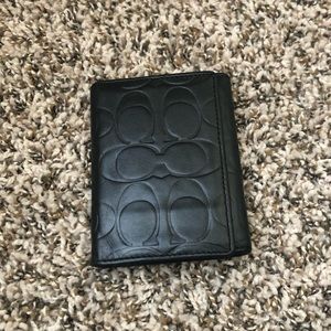 Coach Signature Embossed Trifold wallet